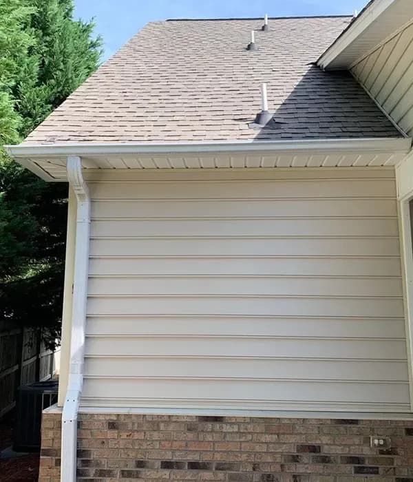 A house with new white siding.
